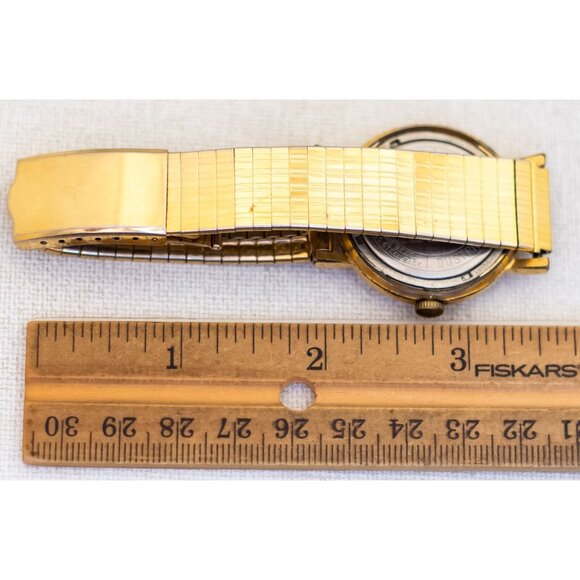 7 inch, Vintage Simplistic Round Gold Tone Watch by Timex - T25 - Picture 3 of 3